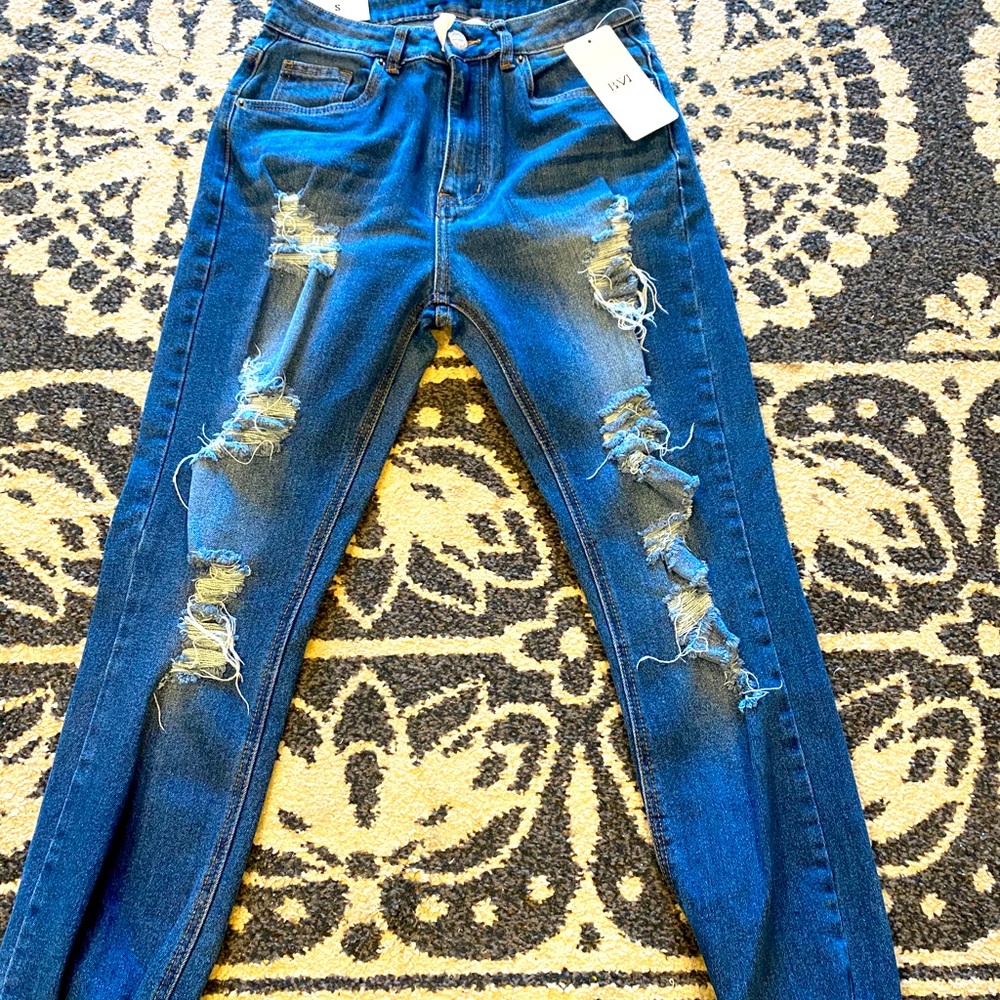 New with tags. Distressed joggers